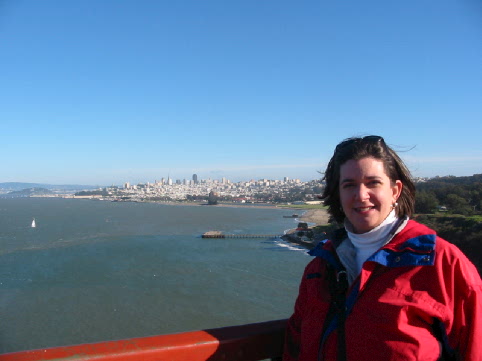Bethany on the Golden Gate Bridge with San Francisco in the background